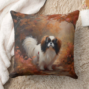 Coussin Japanese Chin en automne, les feuilles tombées ins