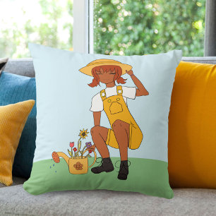Coussin Jardinage fille avec dessin de fleurs
