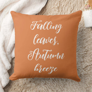 Coussin jeté orange de feuilles mortes et de vent