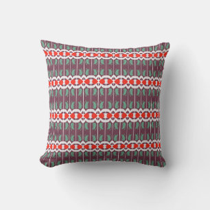 Coussin jeté rouge et blanc prune
