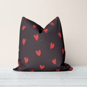 Coussin jeté rouge noir touche aimante