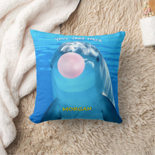 Coussin Joli dauphin soufflant du bubble gum, nom et messa