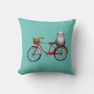 Coussin Joli petit sceau de dessin animé sur un vélo