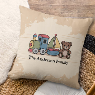 Coussin Jouets en bois avec train, voilier et ours en pelu