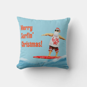 Coussin Joyeux Noël de surf Santa sur son surfboard