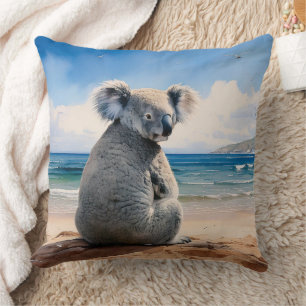 Coussin Koala sur une plage de sable