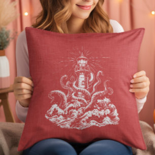 Coussin Kraken avalant un phare sur lin rouge