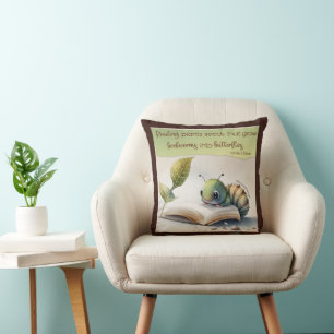Coussin La lecture transforme les vers de livre en papillo