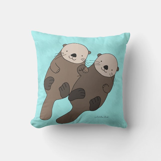 Coussin La loutre tenant des mains reposent le carreau (Recto)