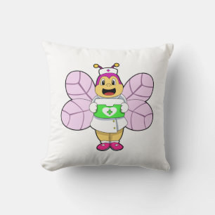 Coussin L'abeille comme infirmière avec le premier kit de