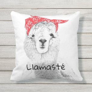 Coussin L'adorable lama portant une banane rouge