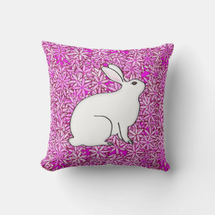 Coussin Lapin sur un lit de fleurs printanières