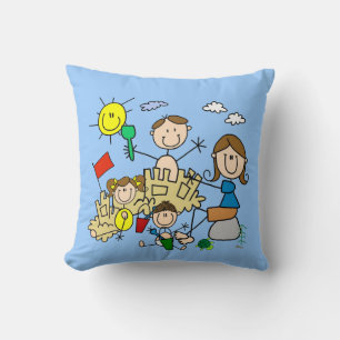 Coussin Le bâton figure l'amusement de plage de famille