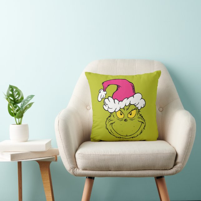 Coussin Le Grinch avec un chapeau de Père Noël rose (Chaise)