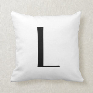 Coussin Le monogramme repose la lettre L