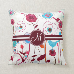 Coussin Le ressort coloré de monogramme fleurit la mûre