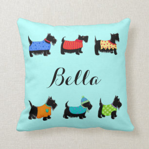 Coussin Le Scottie noir poursuit la turquoise