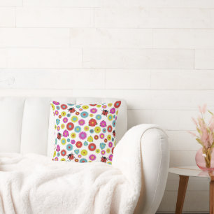 Coussin Les coccinelles dans le jardin parmi les fleurs