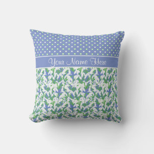 Coussin Les perce-neiges modèlent et pois sur le bleu