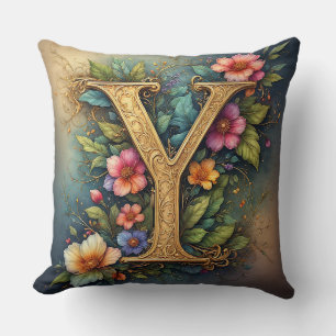 Coussin Lettre Y dorée ornée entourée de fleurs vibrantes