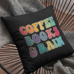 Coussin Livres à café et pluie<br><div class="desc">Livres,  café et coussin de pluie : c'est la combinaison parfaite pour les amateurs de livres et les accros du café.</div>