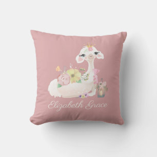 Coussin Llama rose et blanc avec des fleurs féminines