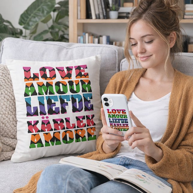 Coussin Love in Multilanguages Neon Hearts (A throw pillow that says love in multiple languages with a heart pattern.)