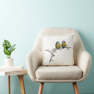 Coussin Lovebirds assis sur une branche de fleurs de ceris