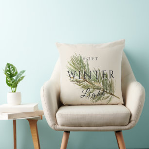 Coussin Lumière d'hiver douce avec branche de pin