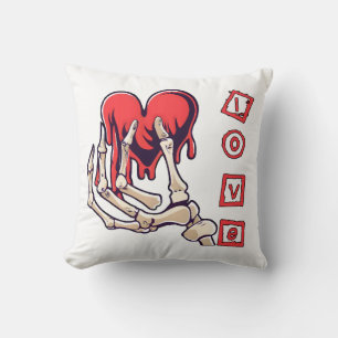 Coussin Main de squelette symbolique de l'amour offrant un
