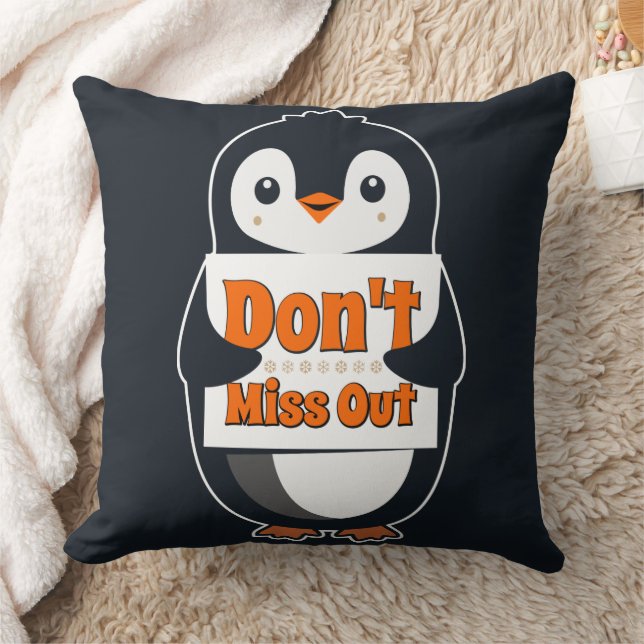 Coussin Manchot avec un panneau Ne manquez pas (Couverture)