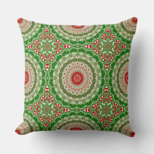 Coussin Mandala festif rouge et vert avec symétrie des fêt