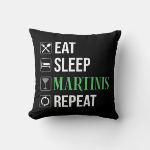 Coussin Manger. Dormir. Martinis. Répéter.