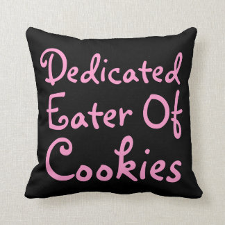 Coussin Mangeur consacré des biscuits. Slogan dans le rose