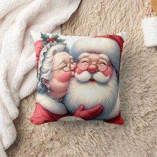 Coussin Mme Clause embrassant le Père Noël Noël