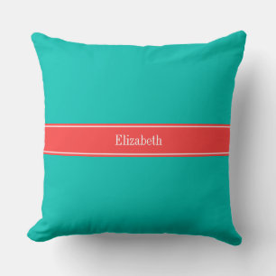 Coussin Monogramme avec ruban rouge corail et sarcelle uni