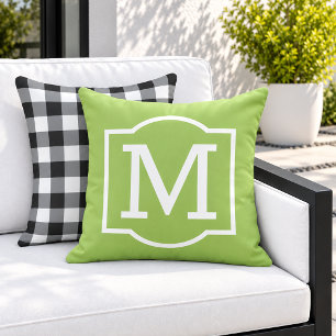 Coussin Monogramme classique entre parenthèses vert lime e