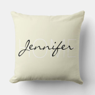 Coussin monogramme de la maison de couleur beige