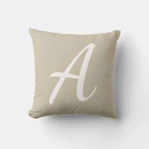 Coussin Monogramme de sable beige