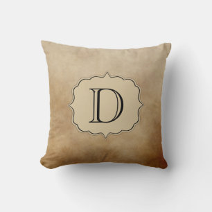 Coussin Monogramme en ivoire d'Ombre de café de crème