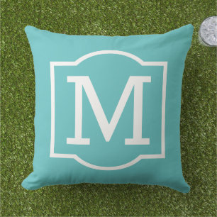 Coussin Monogramme entre parenthèses turquoise blanc gras