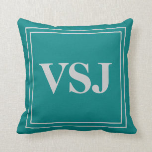 Coussin Monogramme fait sur commande sur le gris et le