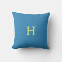 Monogramme jaune sur bleu cyan