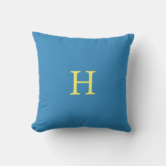 Coussin Monogramme jaune sur bleu cyan