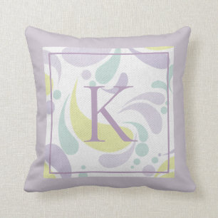 Coussin Monogramme léger en pastel lilas et vert de motif