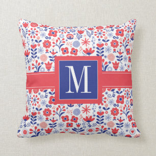Coussin Monogramme motif floral bleu et de corail de  