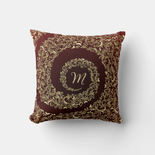 Coussin Monogramme or et bourgogne