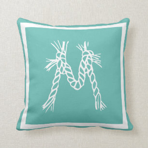 Coussin monogramme turquoise de la corde côtière