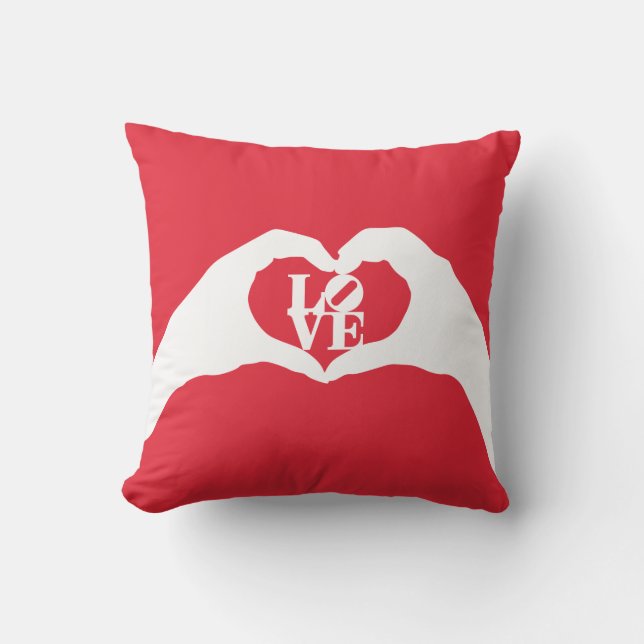 Coussin Mot d'AMOUR et geste de main graphiques de coeur (Recto)