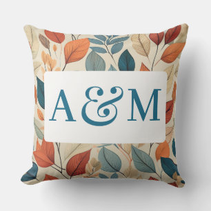 Coussin Motif à feuilles vives avec double monogramme